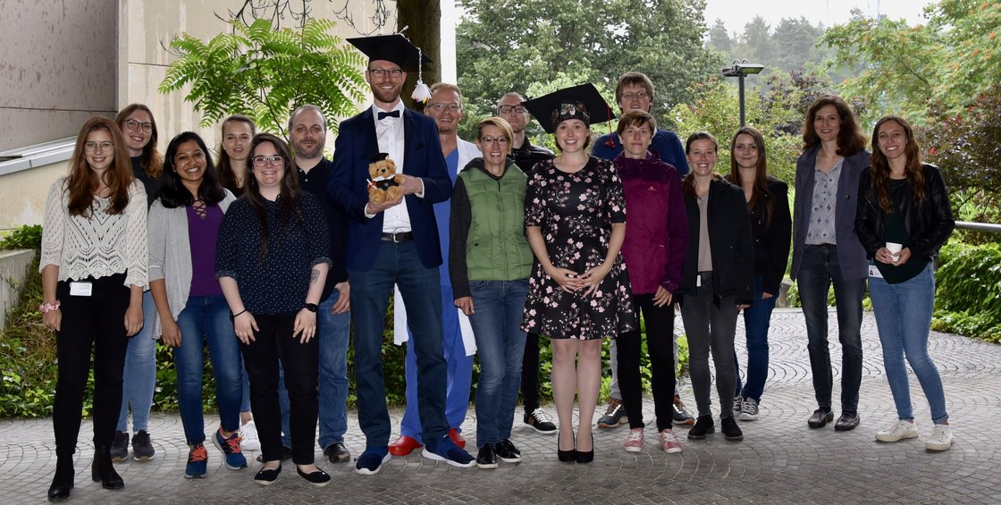 Group photo at the ceremony for the doctoral theses of Jessica Merkle and Frank Arnold
